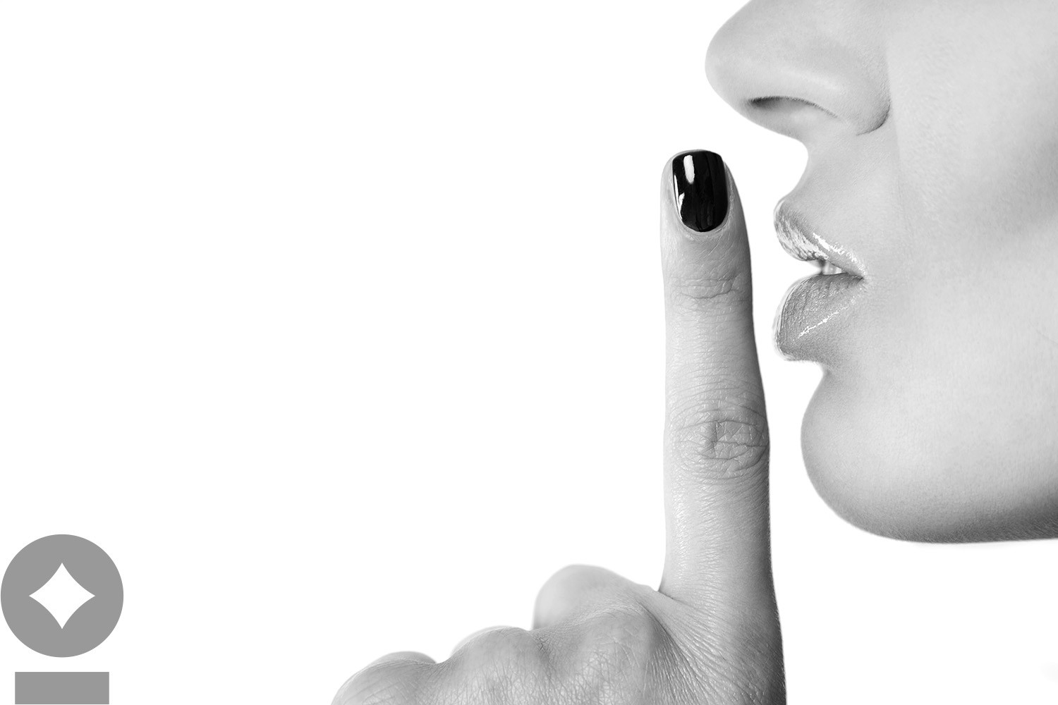American flag flying over government building in city, blue sky and clouds