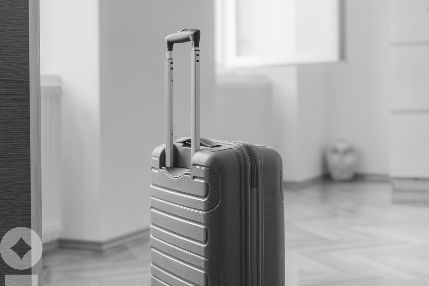 American flag flying over government building in city, blue sky and clouds NewEdge Wealth's The Weekly Edge Never Going Back Again? by Cameron Dawson