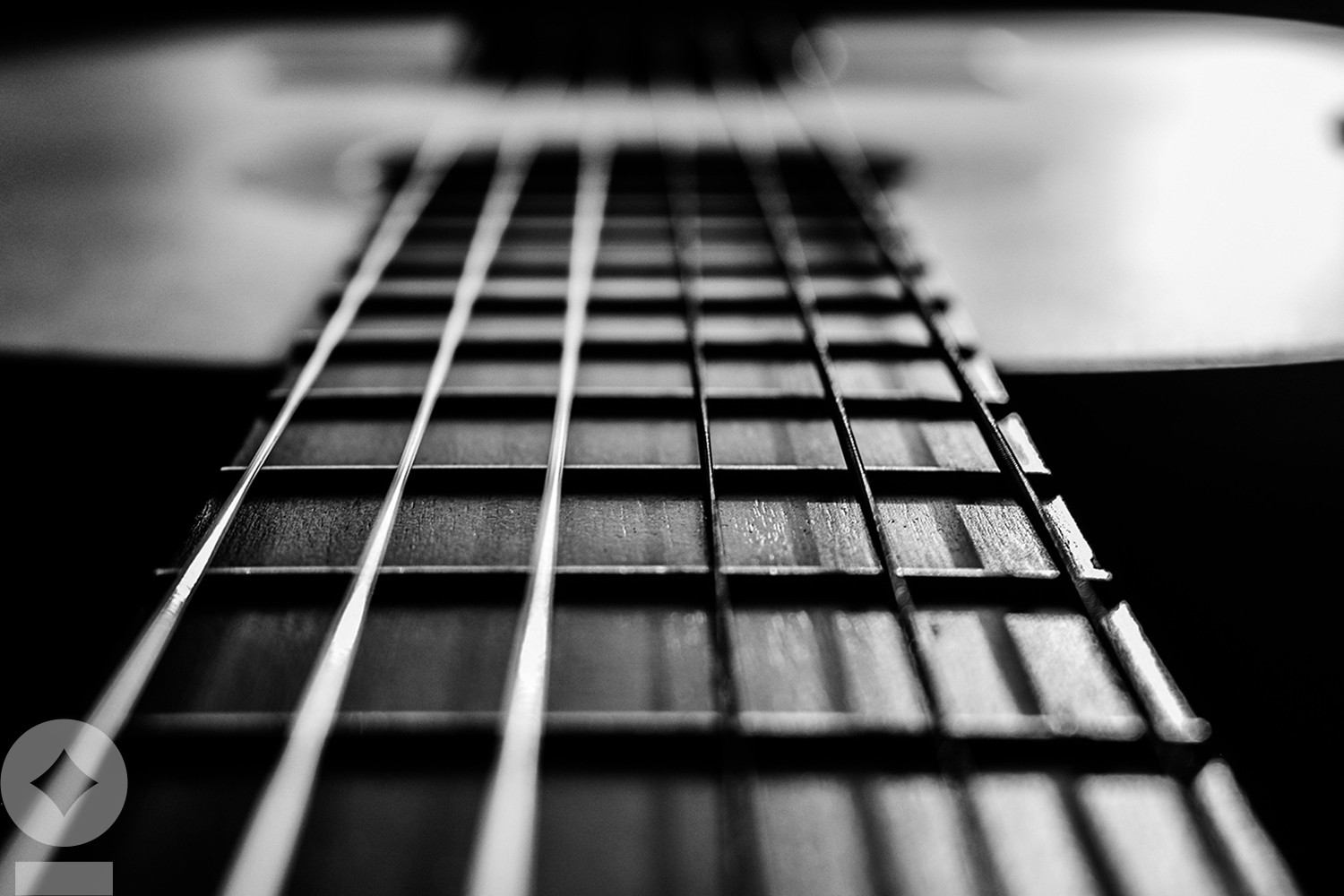 American flag flying over government building in city, blue sky and clouds