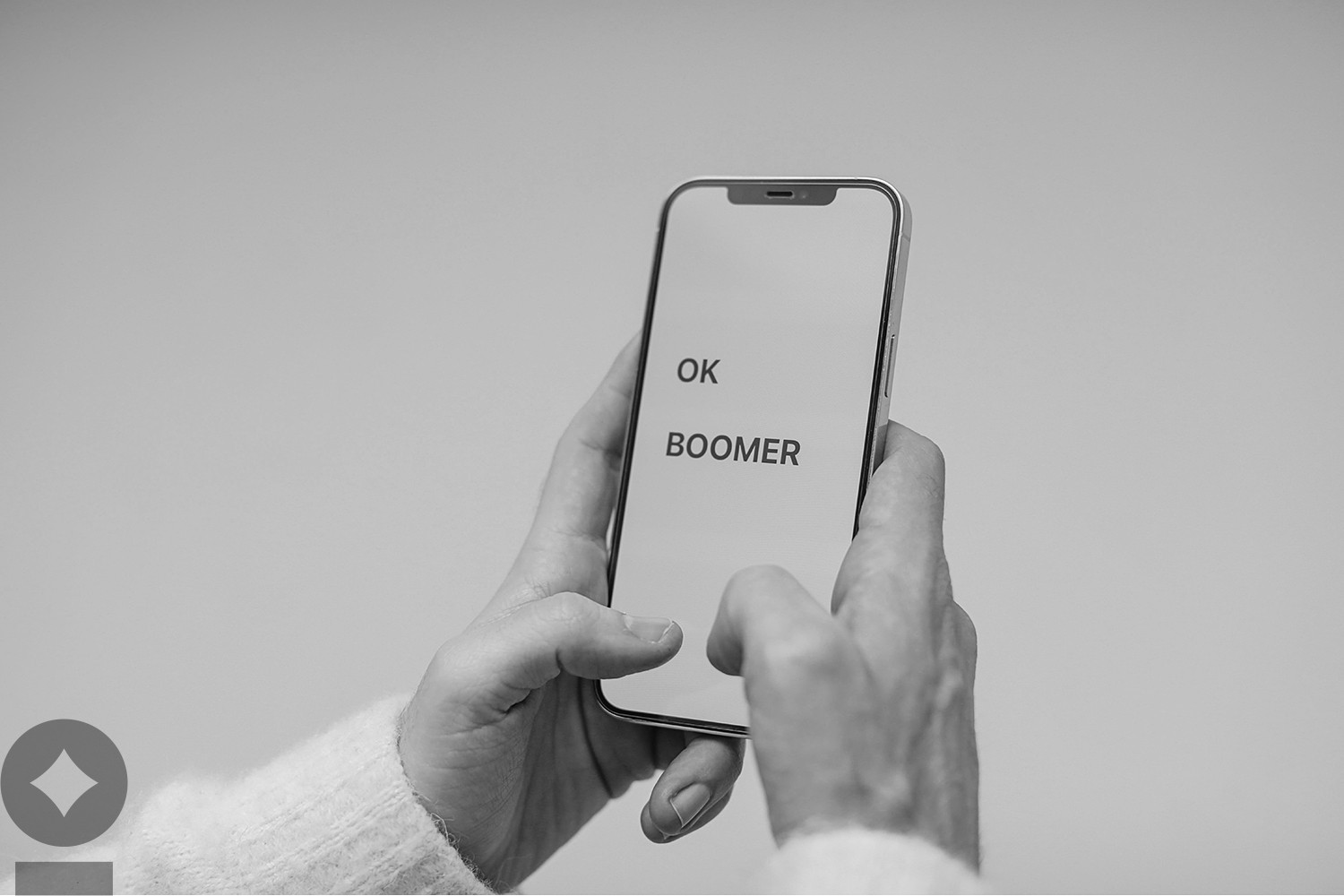 American flag flying over government building in city, blue sky and clouds