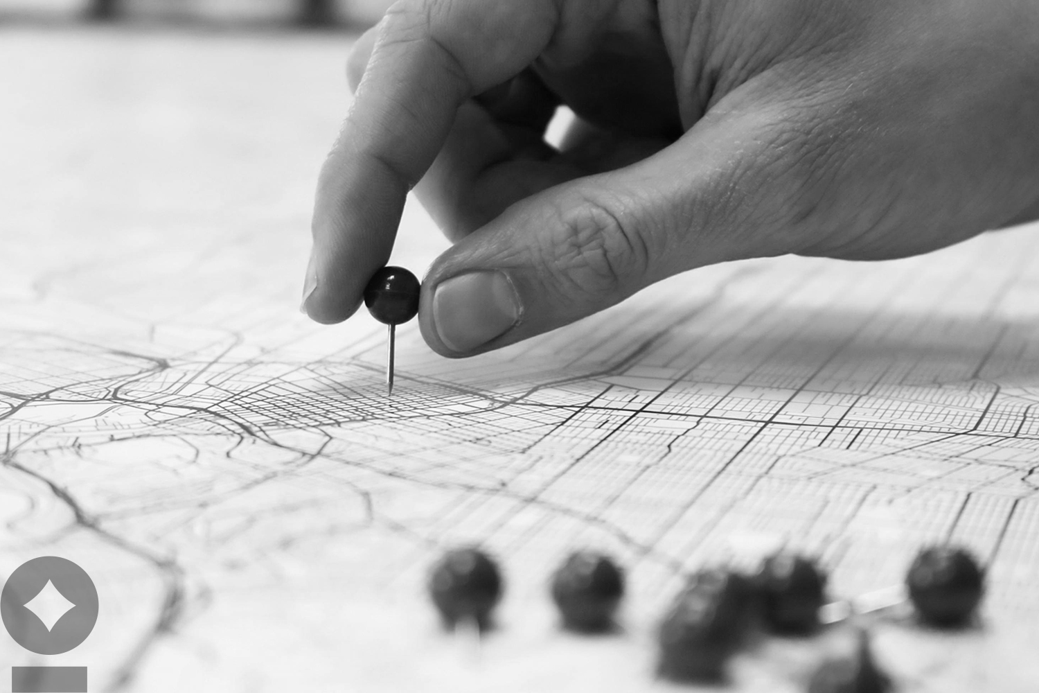 American flag flying over government building in city, blue sky and clouds NewEdge Wealth The Weekly Edge Say You’ll Be There