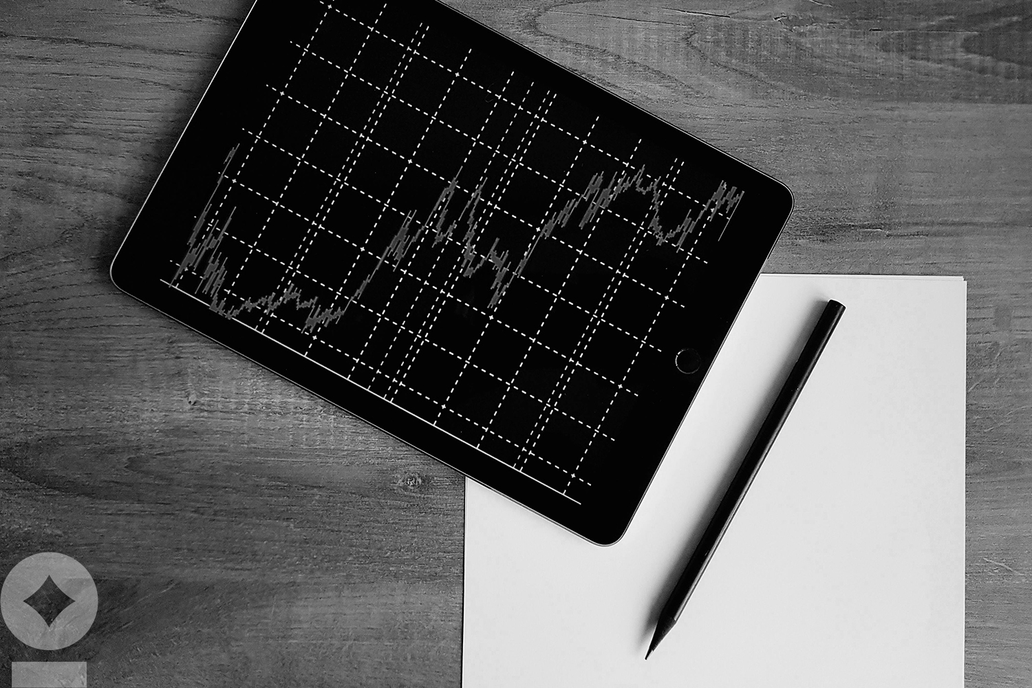 American flag flying over government building in city, blue sky and clouds